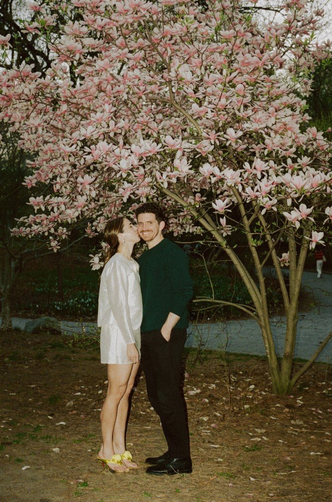 Carley and Chris under a magnolia tree